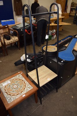 Lot 777 - A modern metal framed clothes rail with shelf