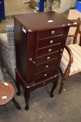 Lot 808 - A jewellery cabinet on stand
