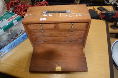 Lot 817 - A wooden tool box and assorted contents