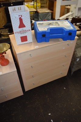 Lot 824 - A three drawer chest of drawers