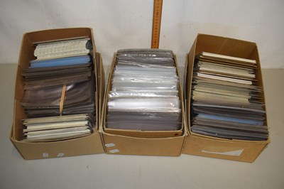 Lot 23 - Three boxes of various postcards and plastic...