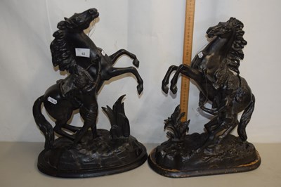 Lot 43 - A pair of bronze effect hollow cast metal...