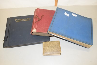 Lot 50 - Three albums of various black and white...