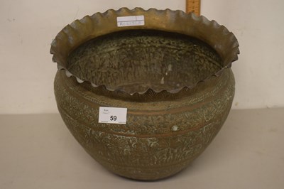 Lot 59 - Middle Eastern brass jardiniere decorated with...