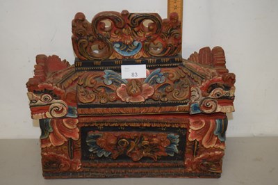 Lot 83 - A Far Eastern painted and carved wooden box...