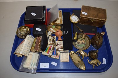 Lot 87 - A tray of mixed items to include brass bells,...