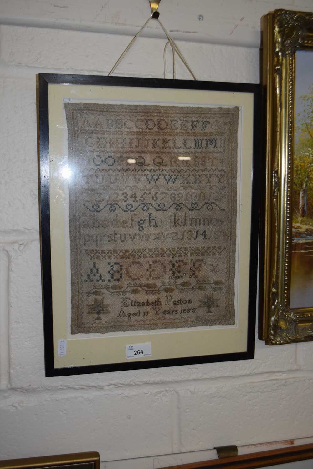 Lot 264 - A Victorian needlework sampler signed...