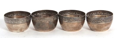 Lot 54 - Group of four white metal small bowls of...