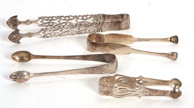 Lot 63 - A group of four sugar tongs to include a pair...