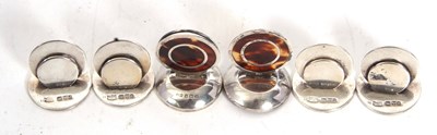 Lot 65 - Four Edwardian silver menu holders of plain...