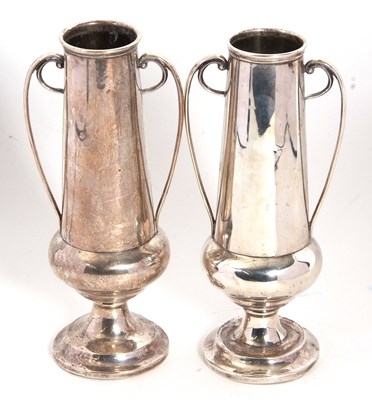 Lot 2 - A pair of Art Nouveau silver twin handled...