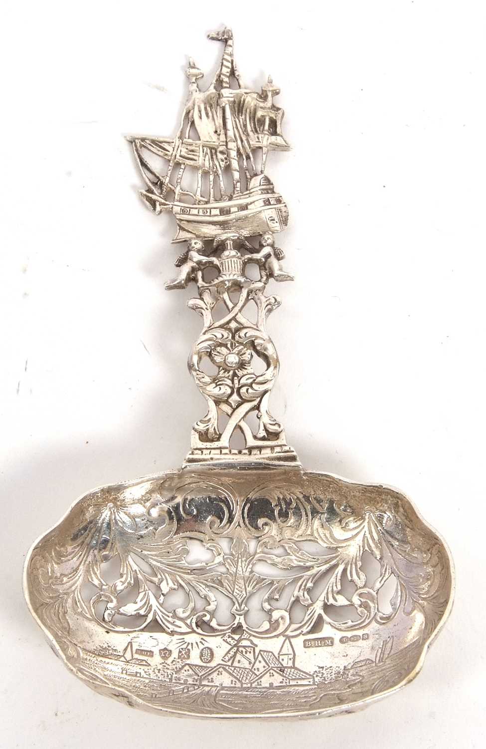 Lot 10 - A Dutch cast silver sifting spoon having a...