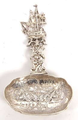 Lot 10 - A Dutch cast silver sifting spoon having a...