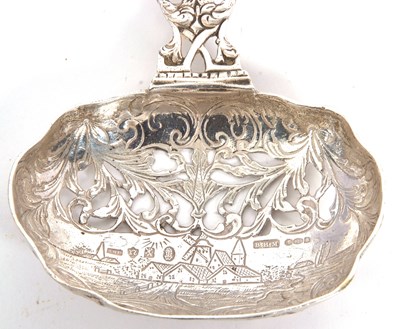 Lot 10 - A Dutch cast silver sifting spoon having a...