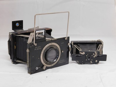 Lot 38 - A Plaubel Makina folding camera and an Ensign '...