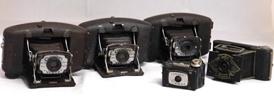 Lot 46 - An Ensign Midget camera; three Coronet 'Vogue'...