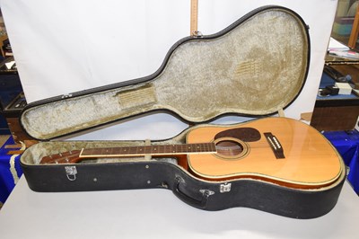 Lot 73 - A Woodstock acoustic guitar with travel case