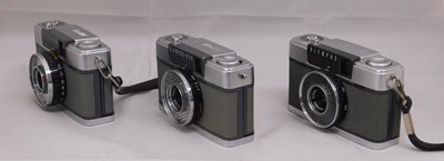 Lot 80 - Three Olympus camera's: an Olympus-Pen Pen-EE,...