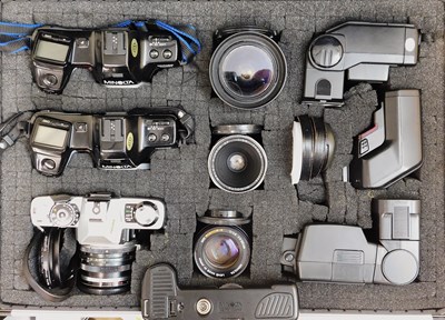 Lot 92 - Minolta: a hard shell aluminum camera case and...