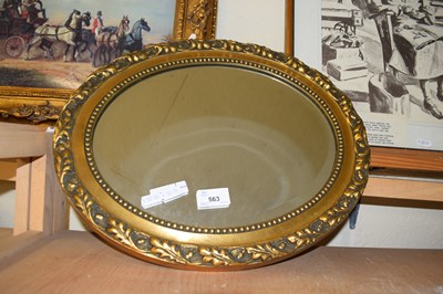 Lot 563 - SMALL OVAL BEVELLED MIRROR IN GILT FRAME