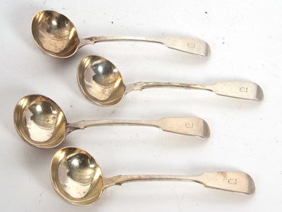 Lot 37 - Group of four Victorian fiddle pattern sauce...