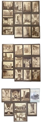 Lot 1276 - A collection of mounted sepia photographs,...
