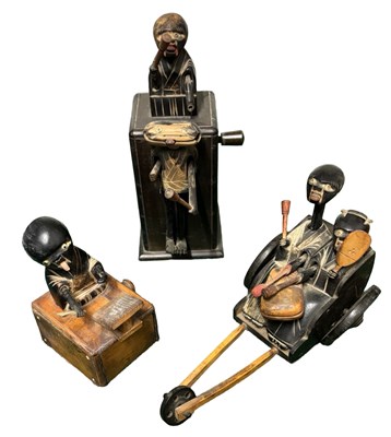 Lot 284 - Three oriental wooden moving toys (a/f)