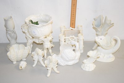 Lot 10 - A group of cream glazed porcelain items to...