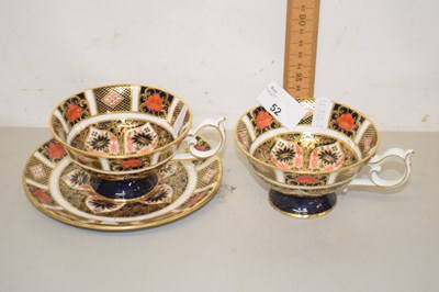 Lot 52 - A Royal Crown Derby cup and saucer, pattern...