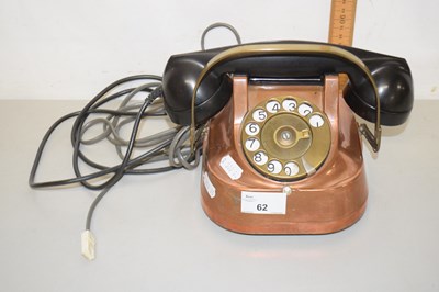 Lot 62 - A vintage copper mounted telephone