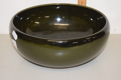 Lot 66 - A Royal Doulton green glazed fruit bowl,...