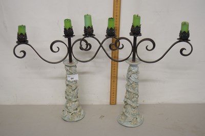 Lot 84 - A pair of three branch metal candelabras