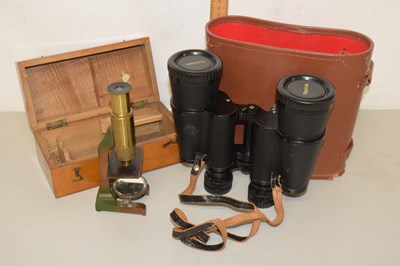 Lot 92 - A vintage brass students microscope together...