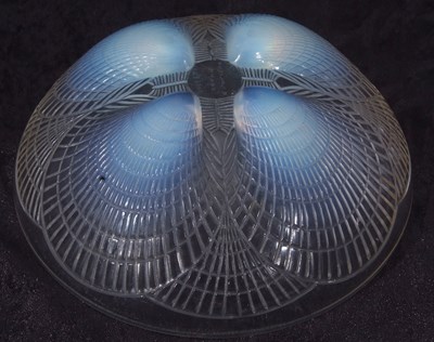 Lot 1 - Lalique Coquilles bowl with opalescent feet,...
