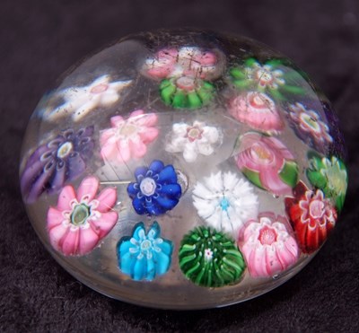 Lot 9 - Small paperweight with multi-coloured canes,...