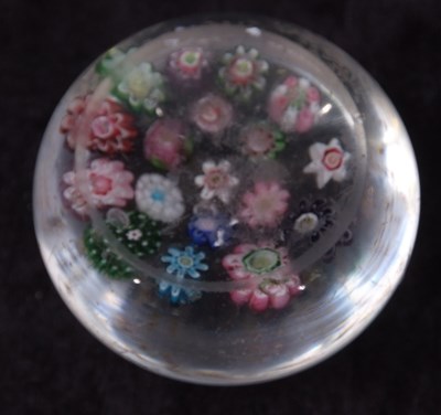 Lot 9 - Small paperweight with multi-coloured canes,...