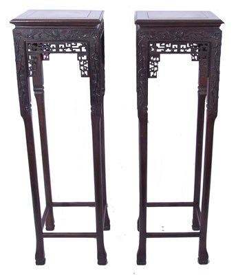 Lot 115 - Pair of Chinese hardwood jardiniere stands,...