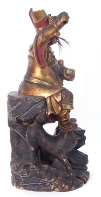 Lot 122 - Interesting wooden model of the Chinese deity...
