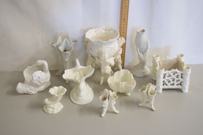 Lot 12 - A group of cream glazed porcelain items to...