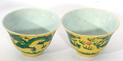 Lot 141 - Pair of small Chinese bowls, the yellow ground...