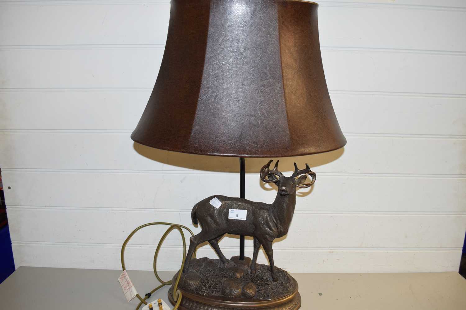 Lot 9 - MODERN TABLE LAMP, THE BASE FORMED AS A...