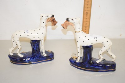 Lot 91 - A pair of Staffordshire style model greyhounds