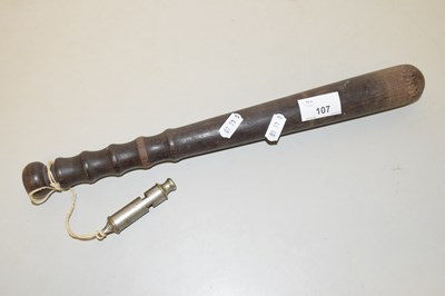 Lot 107 - A vintage truncheon and whistle