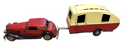 Lot 274 - A tinplate Triang Minic car, together with...