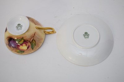 Lot 92 - Aynsley cup and saucer decorated with fruit,...