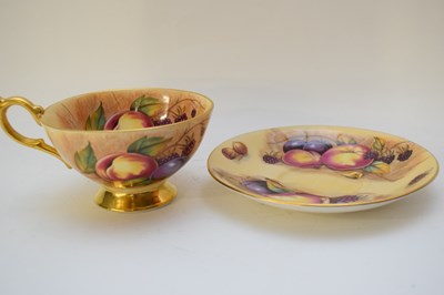 Lot 92 - Aynsley cup and saucer decorated with fruit,...