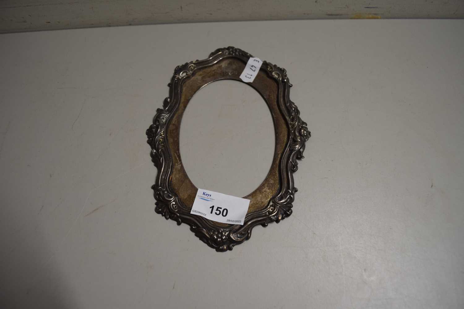 Lot 150 - SILVER MOUNT FOR A PHOTOGRAPH FRAME (LACKING...