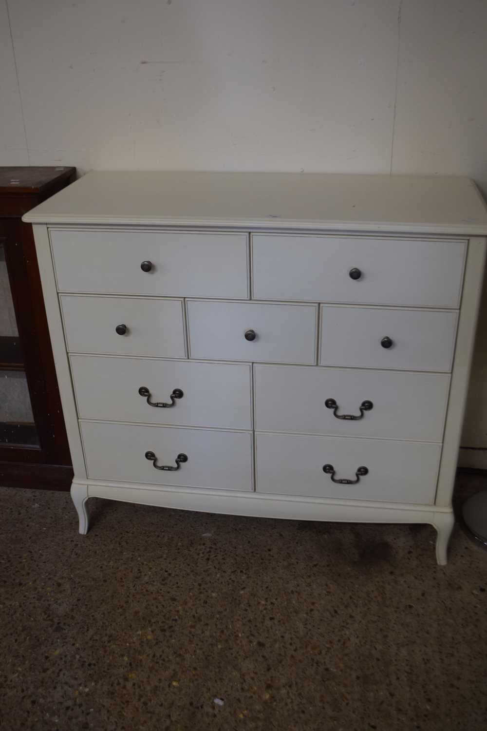 Lot 395 - Marks and Spencers white nine drawer bedroom...