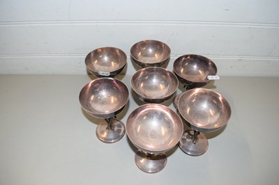 Lot 176 - SET OF SEVEN SILVER PLATED CHAMPAGNE BOWLS...