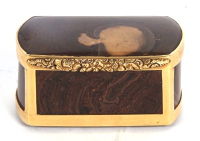 Lot 159 - An agate snuff box of oval form, framed in a...